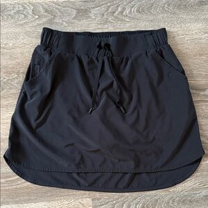 All in Motion SZ S black skort. Slash pockets drawstring & elastic waist